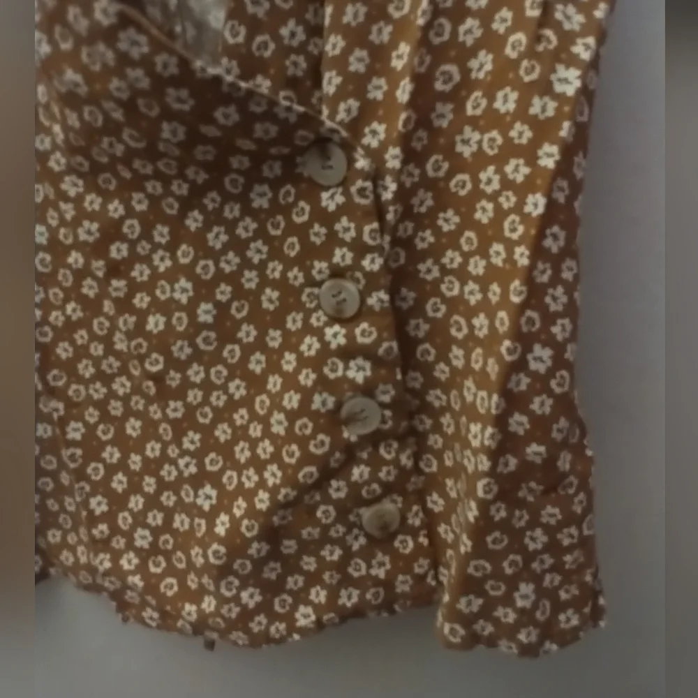Anthropologie Rust Brown Daisy Print Wrap Blouse